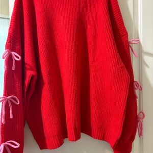 Vibrant Red Sweater with Pink Bow Details